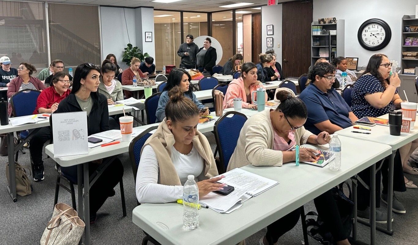 Insurance licensing class in session at Insurance School of Texas, Houston Students in a live insurance licensing class at Insurance School of Texas in Houston